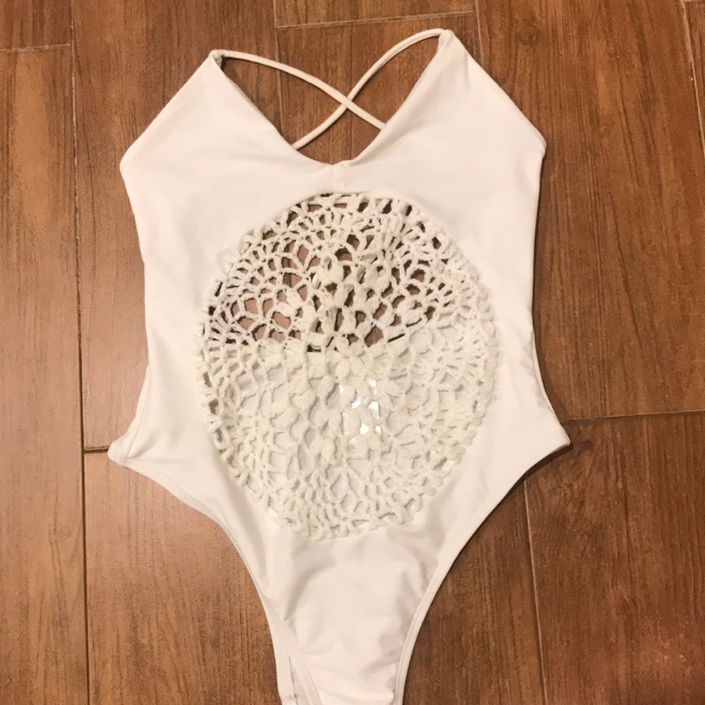 One piece white swimsuit with crochet insert